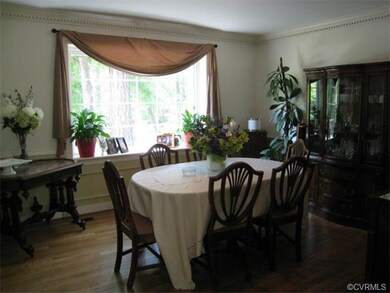 Formal Dining Room with Dental Molding, and Hardwo