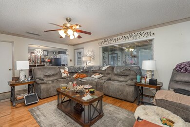 Living room featuring light hardwood / wood-style 