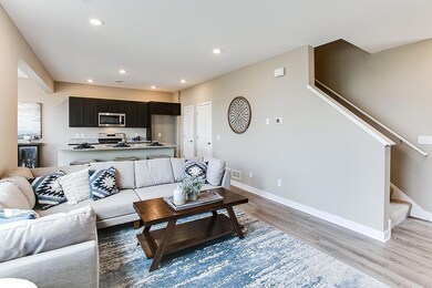 You can feel the connectedness of the kitchen and living room here. *Model photo, selections and colors may vary!