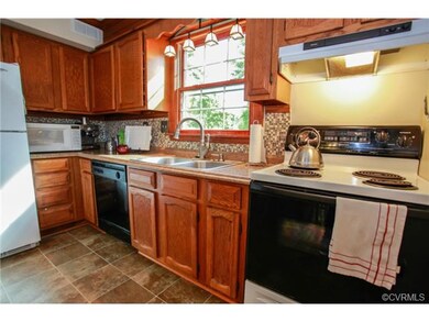 Quaint, country kitchen with new countertop and ti