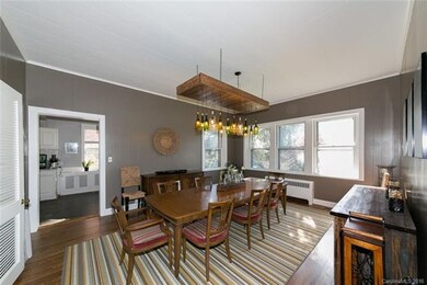 Large dining room with custom designed chandelier