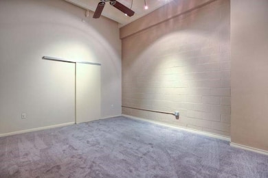 Primary bedroom with fresh new carpet