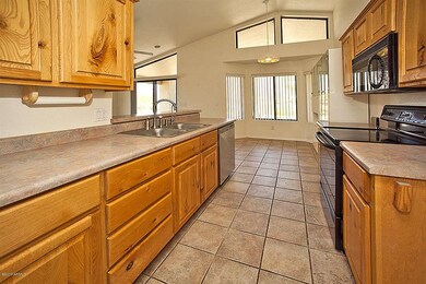 Kitchen view to dining area Rolland Ridg