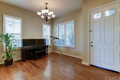 Formal dining area -- notice beautiful wood floori