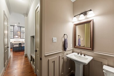 Powder room (aka a half bath) is privately located
