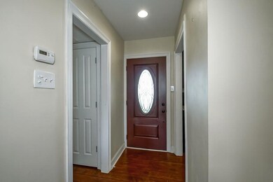 Foyer with wood flooring