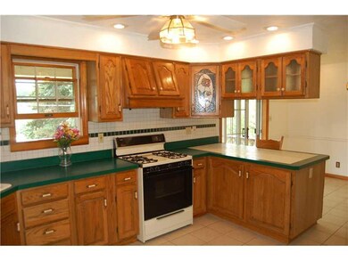 Kitchen. Sliding doors off of dining area lead to 