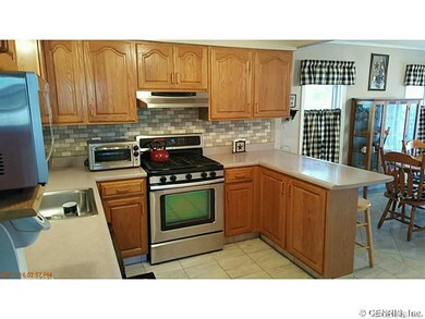 Kitchen. Stainless appliances compliment the upgra