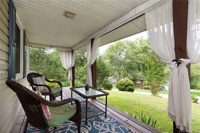 Neighborly waves while you relax on the front porch.