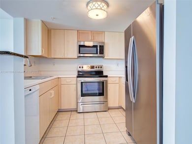 KITCHEN WITH BRAND NEW STAINLESS STEEL APPLIANCES