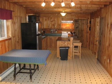 Kitchen with island and dining area