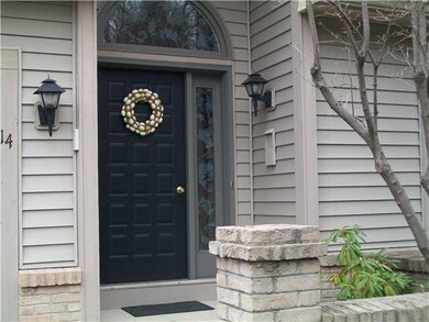 Exterior Front. Close-up view of entry.