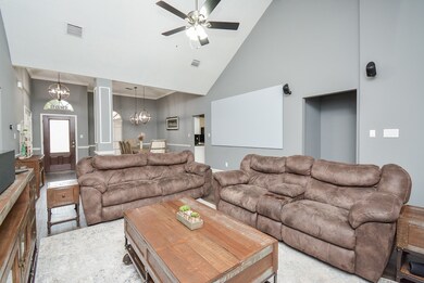 Vaulted ceilings in the Living Room creates an ope