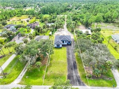 Aerial perspective of suburban area with property parcel outlined
