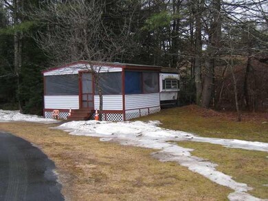 Exterior Front. Camper with screened...