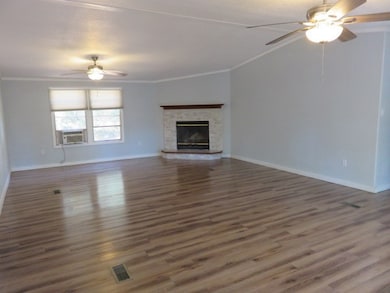 Living area with wood burning fireplace