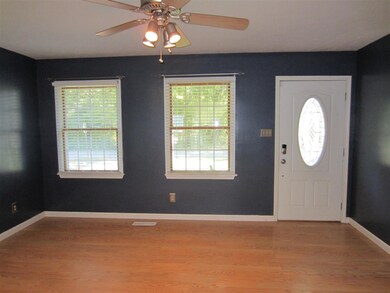 The spacious Living Room has 3/4 in wood laminate 