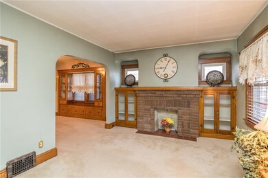 Living and dining rooms with beautiful natural woodwork