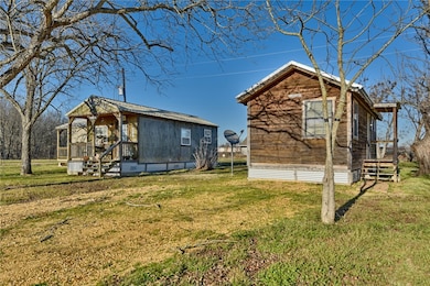 View of home's exterior featuring a lawn
