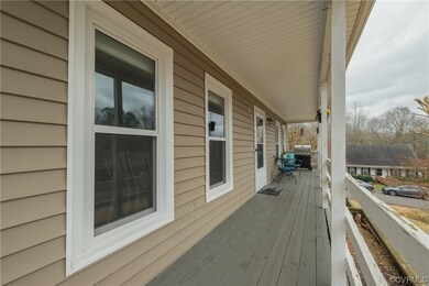 Wooden terrace featuring area for grilling