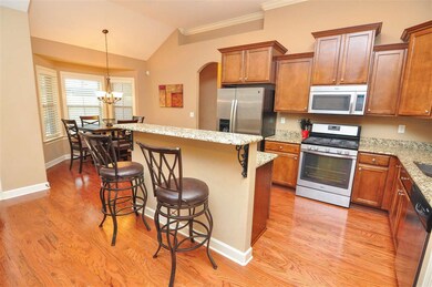The beautiful kitchen is accented by tons of cabin