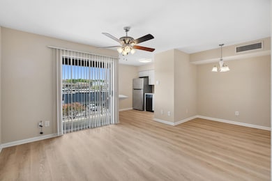Unfurnished living room with light wood finished 