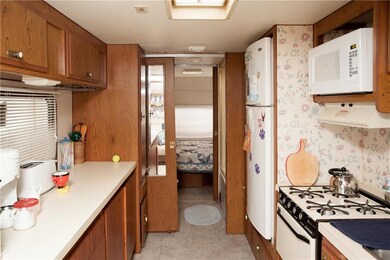 The galley kitchen has everything...