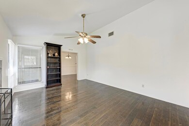Unfurnished living room featuring dark wood finis
