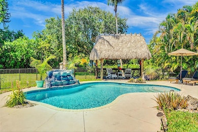 Relaxing waterfall pool on one acre lot in West Da