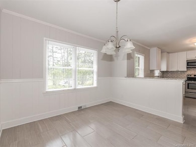 Dining Area flows to Kitchen for easy access
