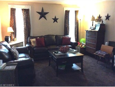 SPACIOUS LIVING ROOM WITH HIGH CEILINGS, WOOD FLOO