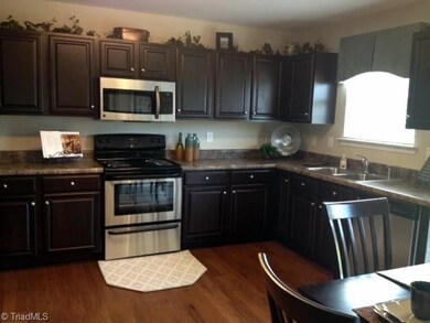 Picture shown is of a similar home. Colors, options and hand of garage may vary.