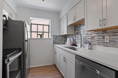 Kitchen featuring appliances with stainless steel