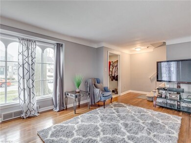 Bright, freshly painted, living room with gleaming