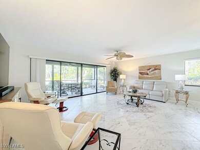Living room featuring ceiling fan