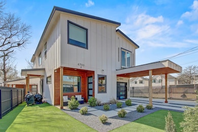 Back of property featuring board and batten siding