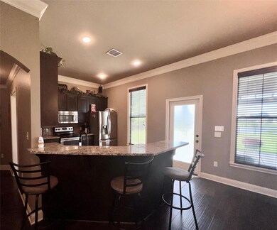 Kitchen featuring appliances with stainless steel 