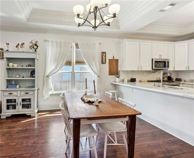 Dinning area with large windows and room for addit