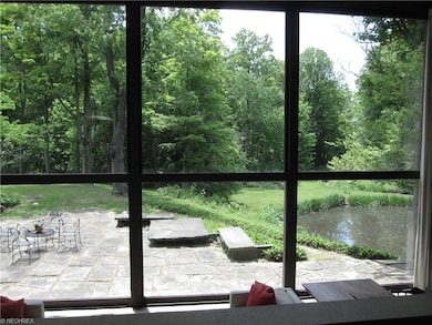 One of three stone patios that surround this home.