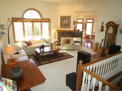 Open and spacious living room with gas fireplace a