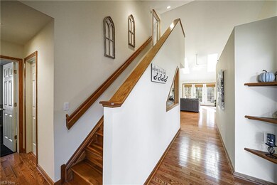 Step inside and notice the real wood floors and va