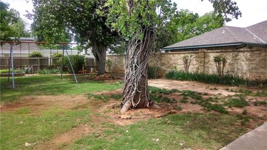 HUGE backyard! Swingset stays - also a tree swing