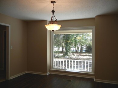Formal dining room can be used as an office or living room.