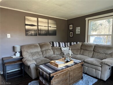 Living room featuring vinyl plank flooring