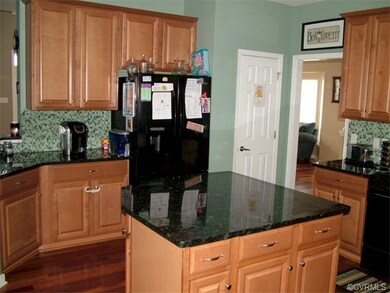 large, open kitchen has maple 42