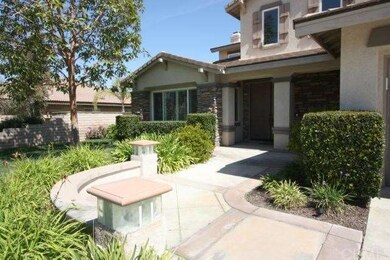 Extensive cement work & stack stone accents