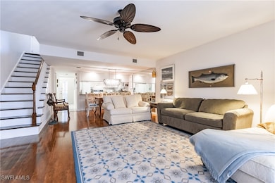 Living room featuring hardwood / wood-style floori