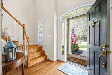 Entrance foyer featuring light wood-type flooring