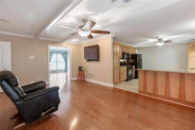 Open floor plan between kitchen and living area