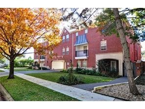 View of property with an attached garage